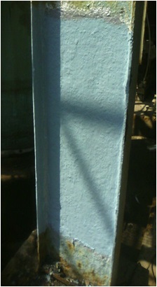 Rusted pillar coated with Advashield Bandorust HB and Advashield Anticorrosive Coating